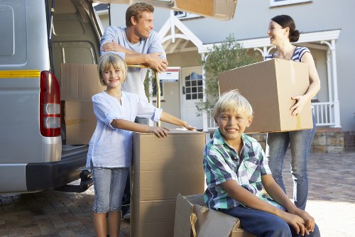 Packed boxes and furniture stored securely in a Newington storage facility